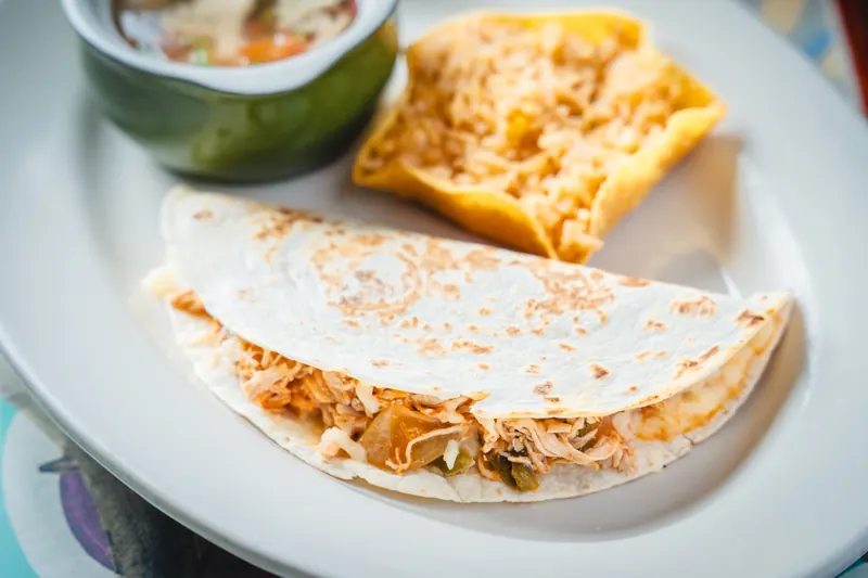 Quesadilla Mexicana with rice and a cup of soup